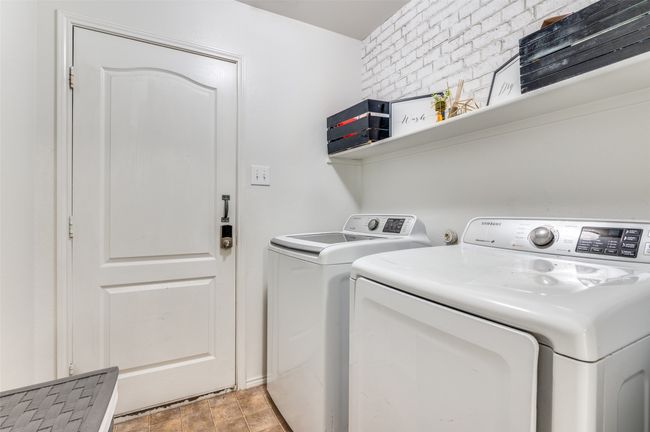 Washroom with washer and dryer. | Image 13