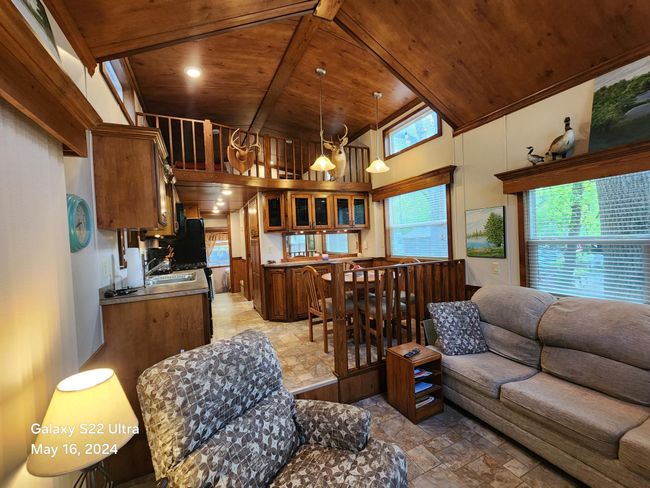 Cabin feeling at the lake with a bedroom, sleeper sofa, loft plus private bedroom area in loft | Image 9