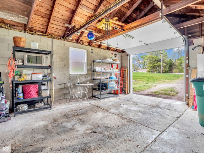 garage featuring concrete block wall | Image 29