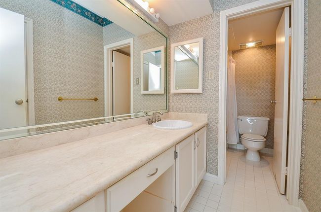 The bath had double sinks, a long vanity, tub/shower and walk-in closet. | Image 14