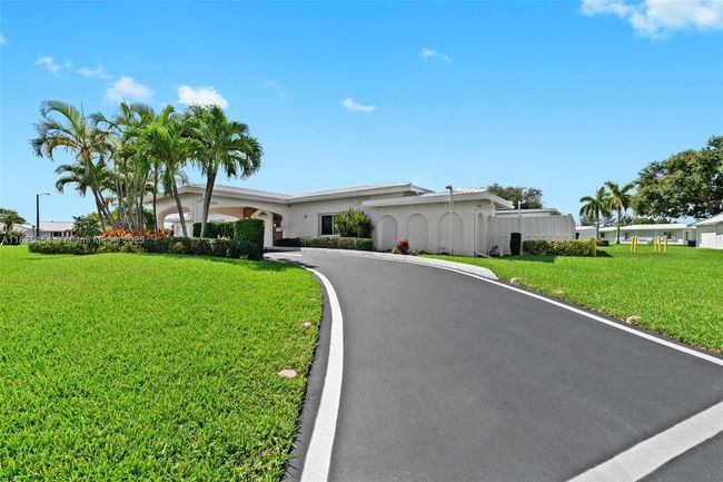 6905 Nw 73 Rd St, House other with 2 bedrooms, 2 bathrooms and null parking in Tamarac FL | Image 25