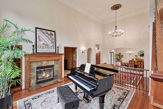 Fireplace sun room and to office | Image 12