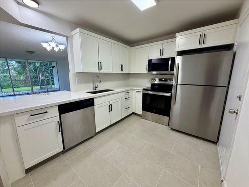 h101-1101 Ne 191st St, Miami, FL, 33179-4026 | Card Image
