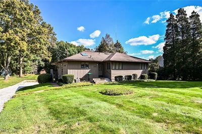 View of front of home featuring a front lawn | Image 1