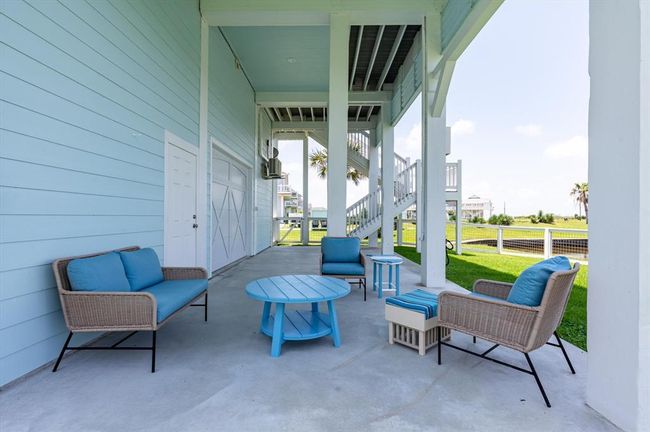 Backyard patio is great for watching the fish or the beautiful sunsets | Image 48