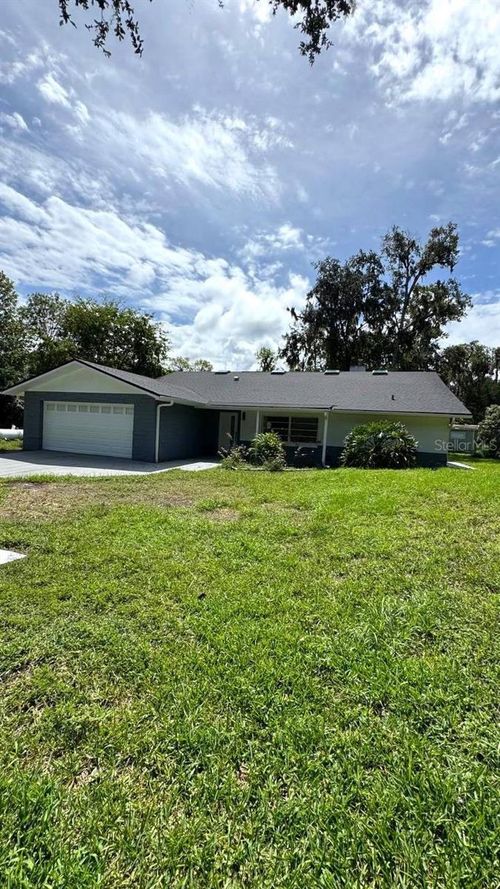 385 S Wild Orange Dr, New Smyrna Beach, FL, 32168-8379 | Card Image