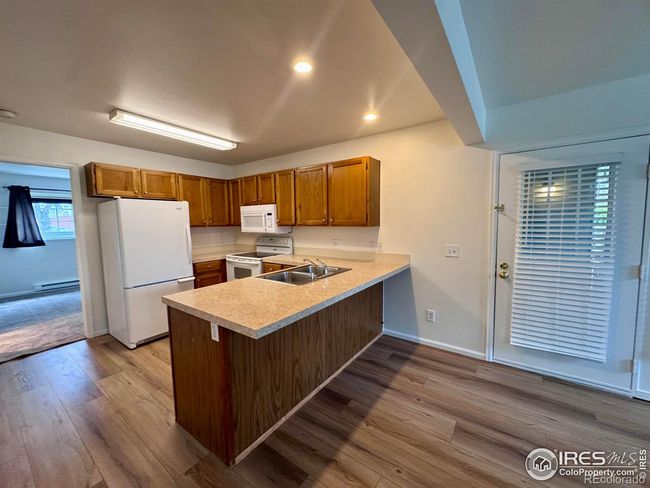 Kitchen with ample cabinets and counter space | Image 9