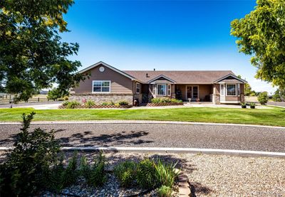 859 Shoshone Street, House other with 5 bedrooms, 2 bathrooms and 4 parking in Strasburg CO | Image 2