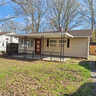 View of front of house with a front lawn and a porch | Image 1