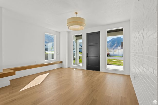 Entryway featuring light wood-style flooring and plenty of natural light | Image 9