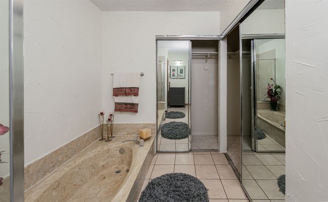Full bathroom featuring tile patterned floors and a washtub | Image 11