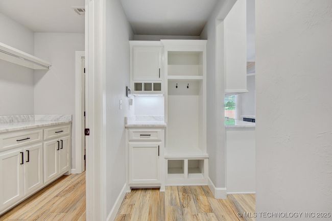Mud room next to laundry | Image 33