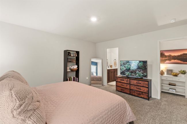 Bedroom with light carpet | Image 16