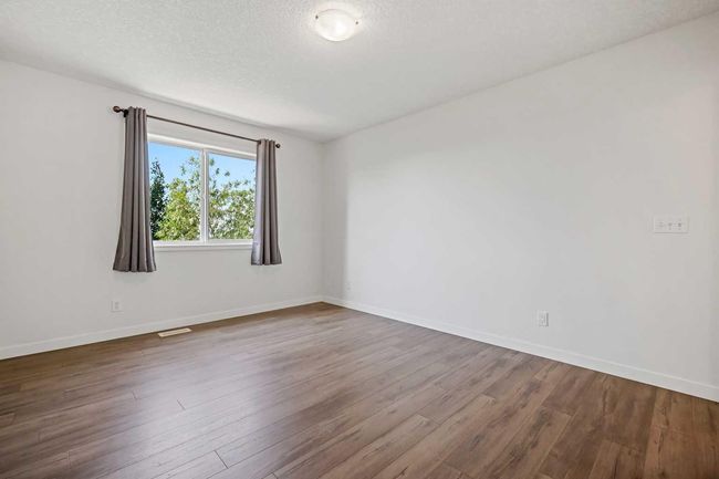 19 Rockyspring Green Nw, House other with 4 bedrooms, 4 bathrooms and 4 parking in Calgary AB | Image 25