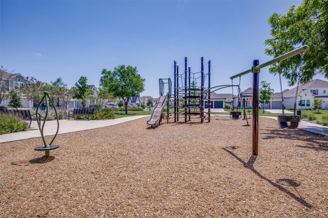 Pecan Square has two spacious community playgrounds that are perfect for family picnics, play time and games. | Image 31