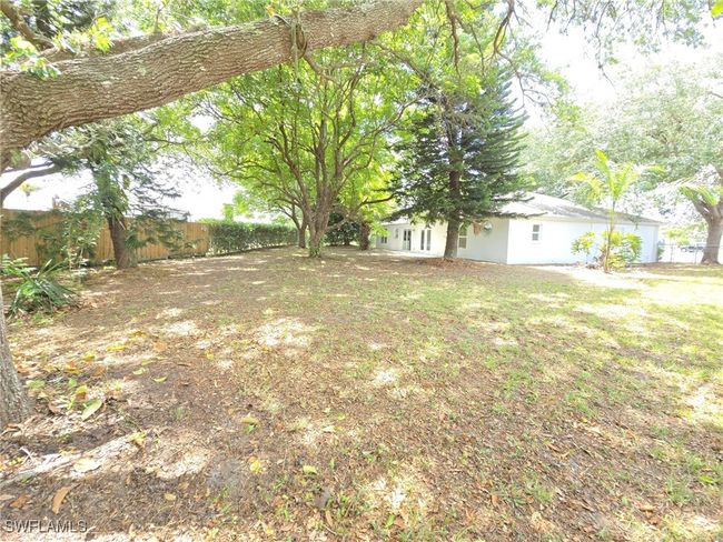 View of yard with fence | Image 44