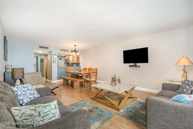 Dining/ Living Area with Silder to Balcony with Ocean View | Image 18
