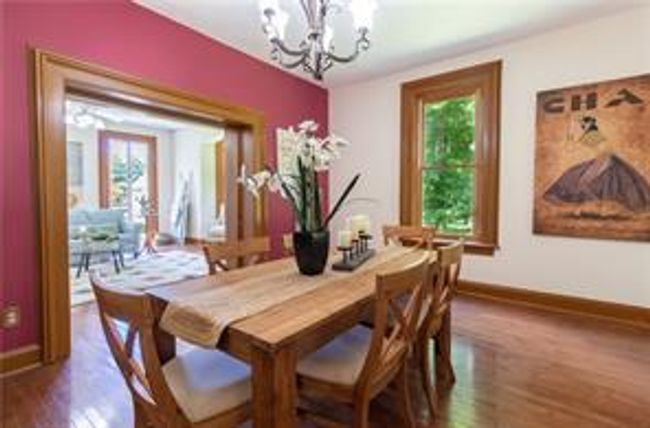 Dining room has pocket doors, high ceilings | Image 6