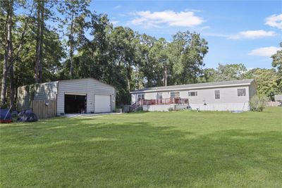 Back view of the home and detached garage | Image 2