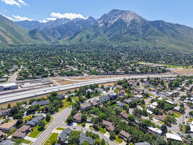 Aerial perspective of suburban area featuring a mountainous background | Image 85