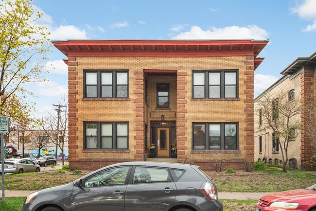 The brick work and old world architecture make this building a beautiful highlight of the neighborhood. Condo #3 is located at the top left. | Image 24