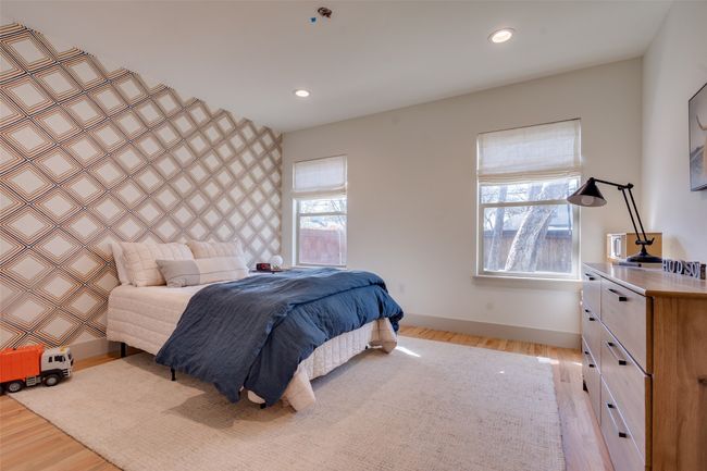 Bedroom featuring recessed lighting, light wood-style flooring, and baseboards | Image 15