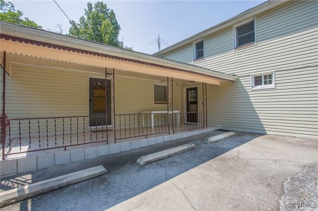 Back of property with a porch | Image 28