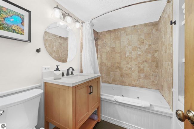 6836 Aarwood Trl Nw, House other with 4 bedrooms, 2 bathrooms and null parking in Rapid City MI | Image 25