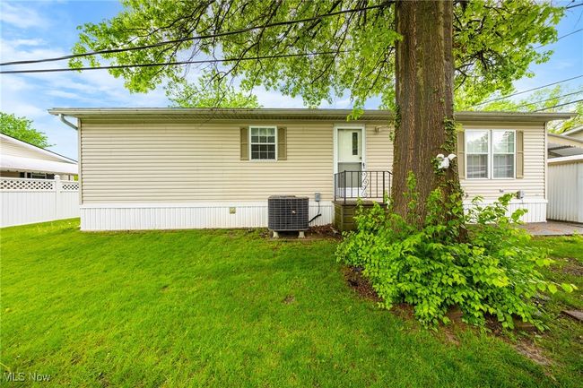 Rear view of property with cooling unit | Image 14