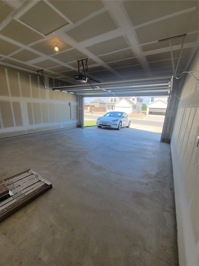 Garage featuring a garage door opener | Image 27