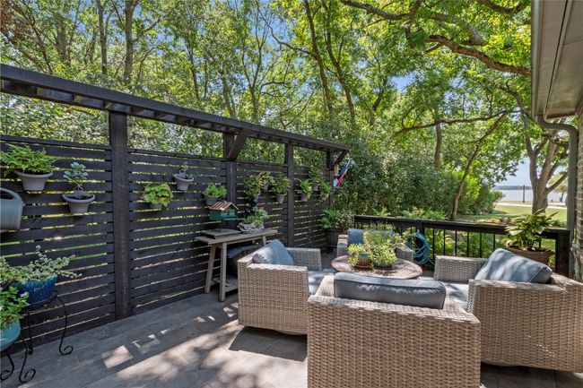 Side patio with water view | Image 27