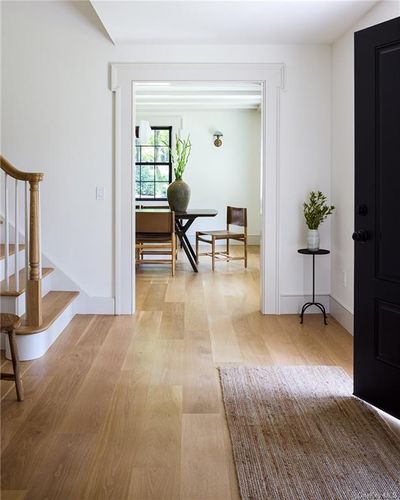 Corridor with light hardwood / wood-style flooring | Image 3