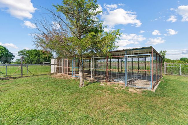View of yard with exterior structure and an outbuilding | Image 36