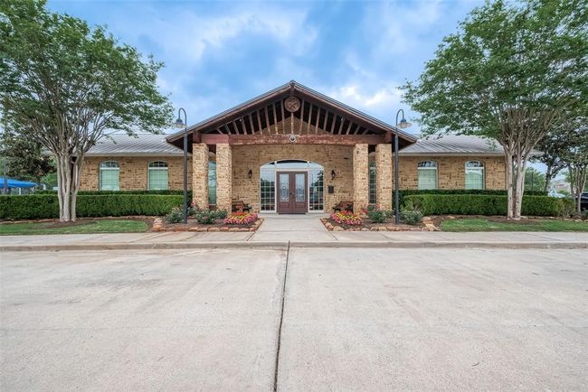 Legends Ranch clubhouse. The fitness center is to the right of the doors. | Image 27