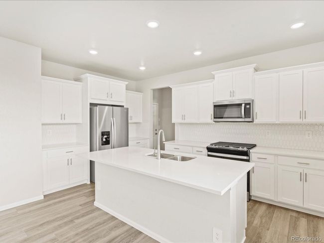 Photos are representative only and are not of the actual home. Actual finishes, elevation, and features may vary. | Image 4