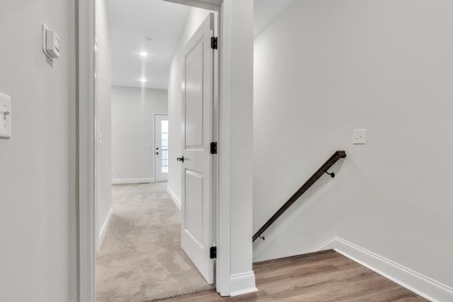 Top of 3rd floor landing where owner's retreat enters toward the front of home. | Image 26