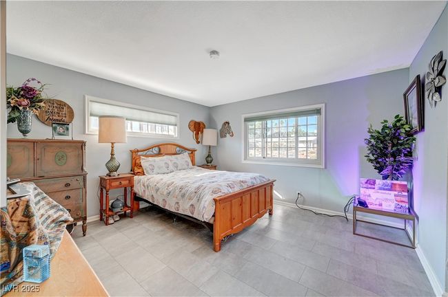 Bedroom featuring baseboards | Image 49