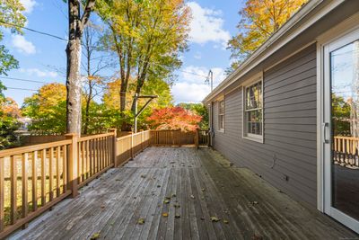 Large deck extends the length of the house. | Image 3