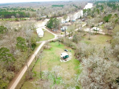 1140 County Road 4445, Spurger, TX, 77660-9326 | Card Image