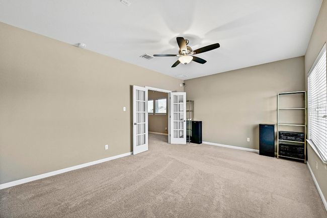 Media room featuring carpet floors and ceiling fan | Image 26