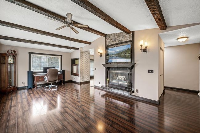 This space would be perfect for a large Informal Dining Room area. Currently being used as a main floor Office. | Image 5