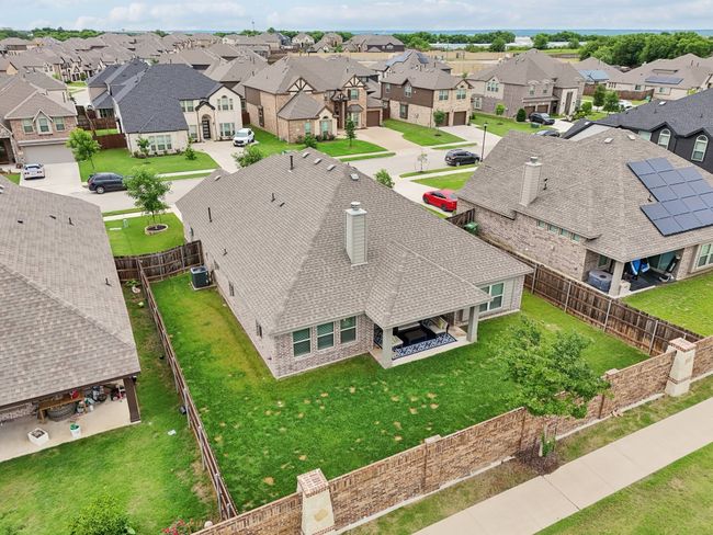 Aerial view of residential area. No back neighbors and beautiful brick and stone tall wall for added privacy | Image 39
