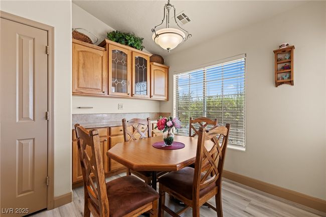 Dining space with light wood-style floors | Image 10