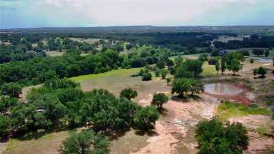 Bird's eye view with a water view | Image 1