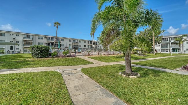 Walk out your lanai to the pool. | Image 29