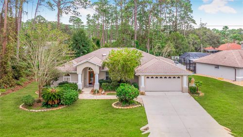 32 Woodward Ln, Palm Coast, FL, 32164-3103 | Card Image