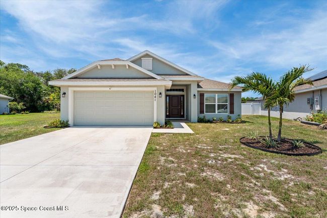 1041 Tupelo Cir, House other with 4 bedrooms, 2 bathrooms and null parking in Cocoa FL | Image 6