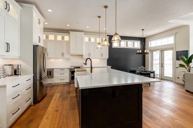 79 Tuscany Estates Close Nw, Home with 4 bedrooms, 2 bathrooms and 4 parking in Calgary AB | Image 6