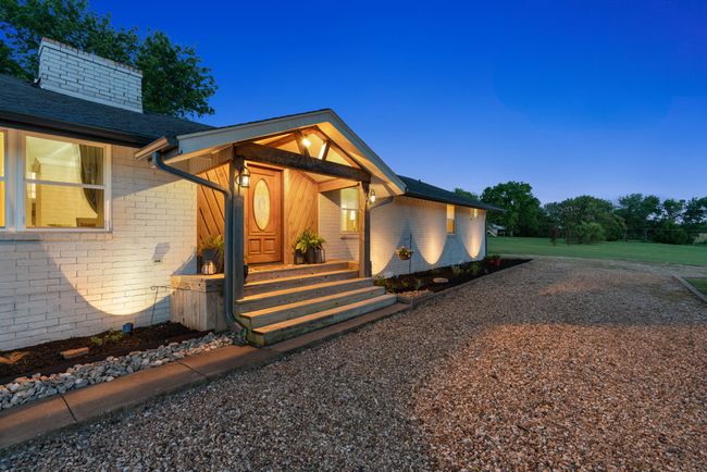 View of front of property with brick siding and roof with shingles | Image 4