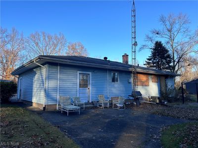 Back of property with a patio and central air condition unit | Image 3